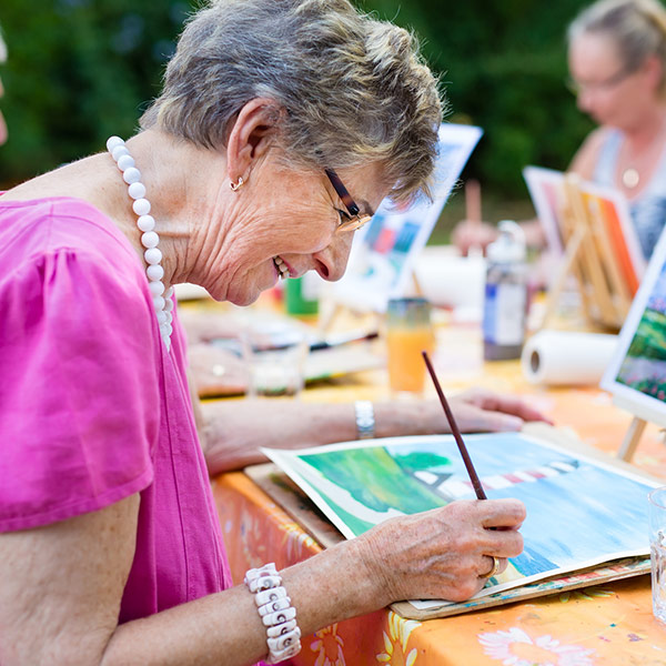 senior woman painting